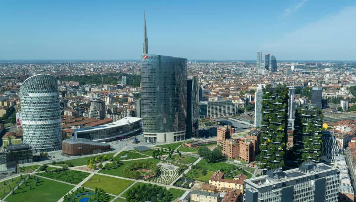 Milano, Italy. Amazing aerial landscape of the iconic Unicredit tower, UnipolSai tower, the Bosco Verticale and BAM public park. Super view of the Porta Nuova district