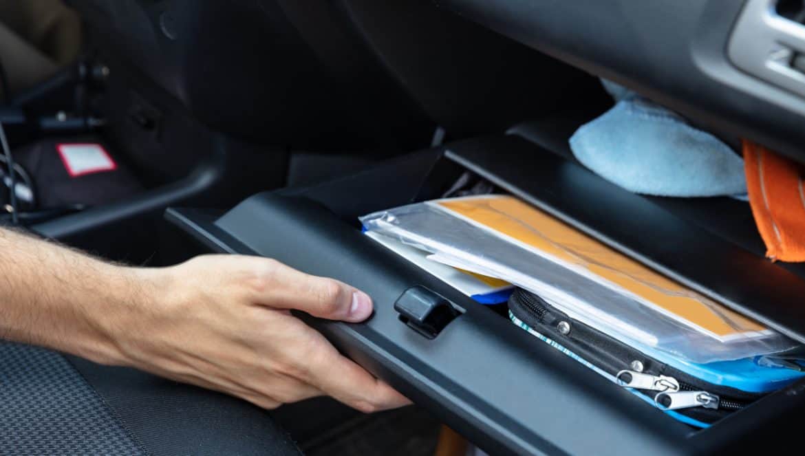 Driver Hand Opening Glovebox Compartment Inside Car