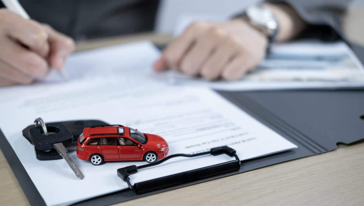 Dealership offered various finance options, including an auto loan or lease, making it easier to buy or rent a car from the company. Agent reviewed contract, finalizing insurance agreement.