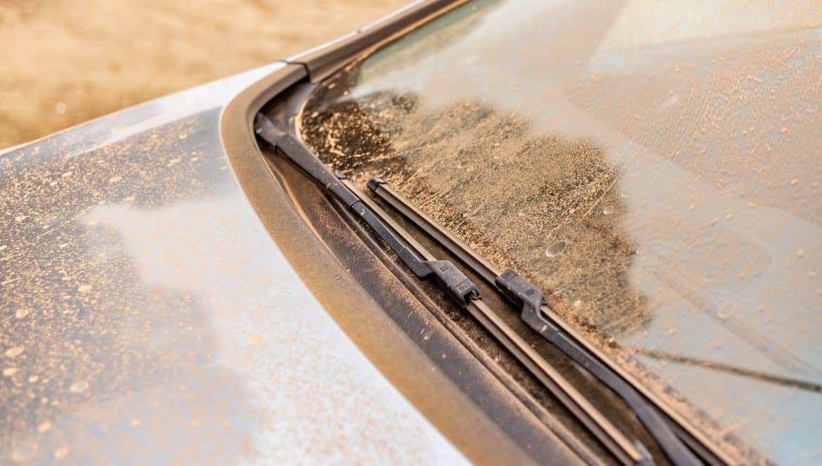 Madrid, Spain. March 15 2022. Car windshield covered with Saharan dust. Rain of mud from the Sahara desert