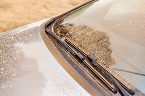 Madrid, Spain. March 15 2022. Car windshield covered with Saharan dust. Rain of mud from the Sahara desert