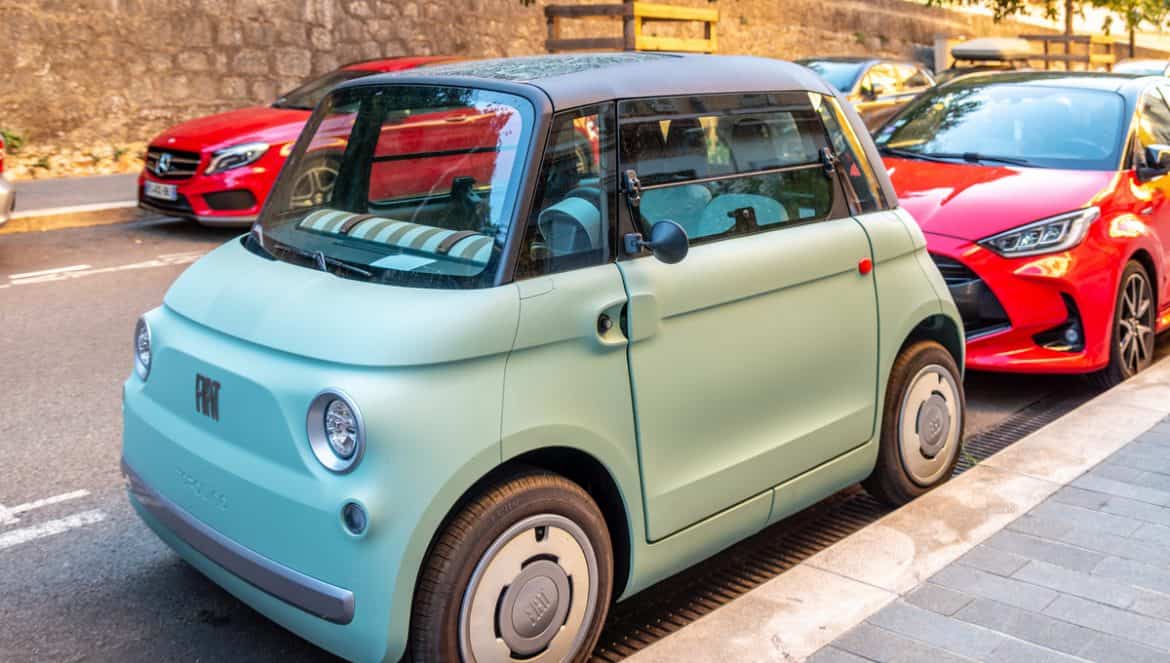 Nice, French Riviera, France - August 30, 2025: New Fiat Topolino - the electric microcar for the city, parked in Nice city center