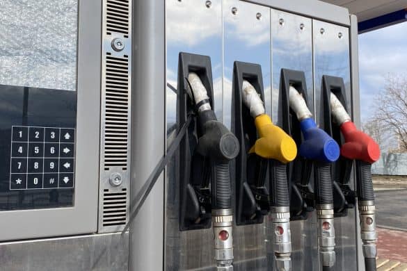 Petrol car refueling. Opening of a new Gas station. Fuel pump close up. Color fuel gasoline dispenser. Empty gas station, under construction. Work stoppage due to violations or covid 19.