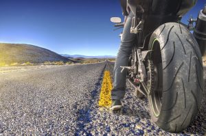 Road crossing the Death Valley with motorbike