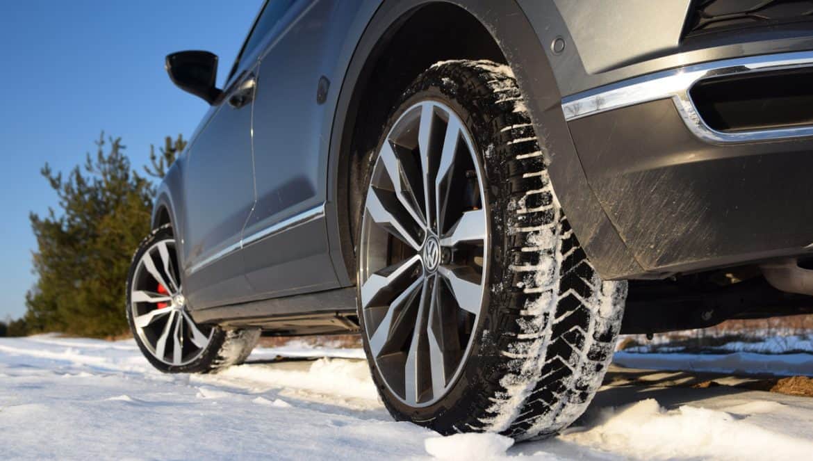Zdiar, Slovakia - 21 March, 2018:  Winter tires in a car on the snowy road. The modern winter tires can increase the car safety level in winter months.