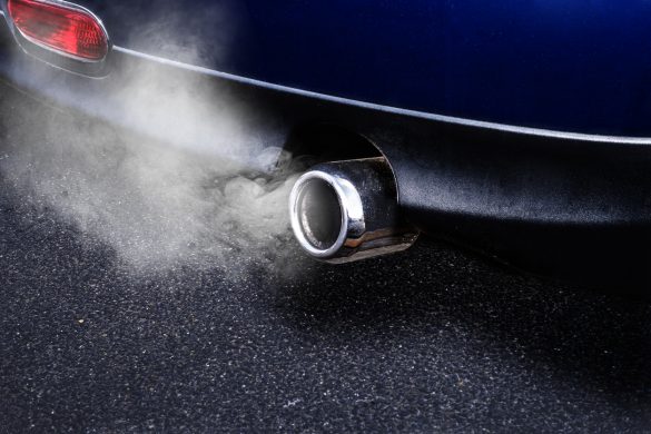 Exhaust pipe emits exhaust gases
sport exhaust pipe blue car