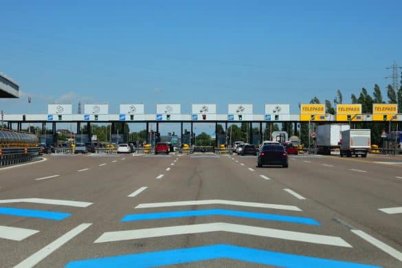 Mestre, VE, Italy - July 8, 2022: Exit Gates of an Italian Motorway and cars