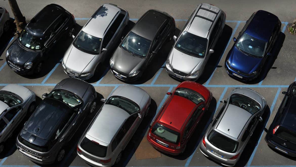 Top view of a car in a parking lot in a italian town